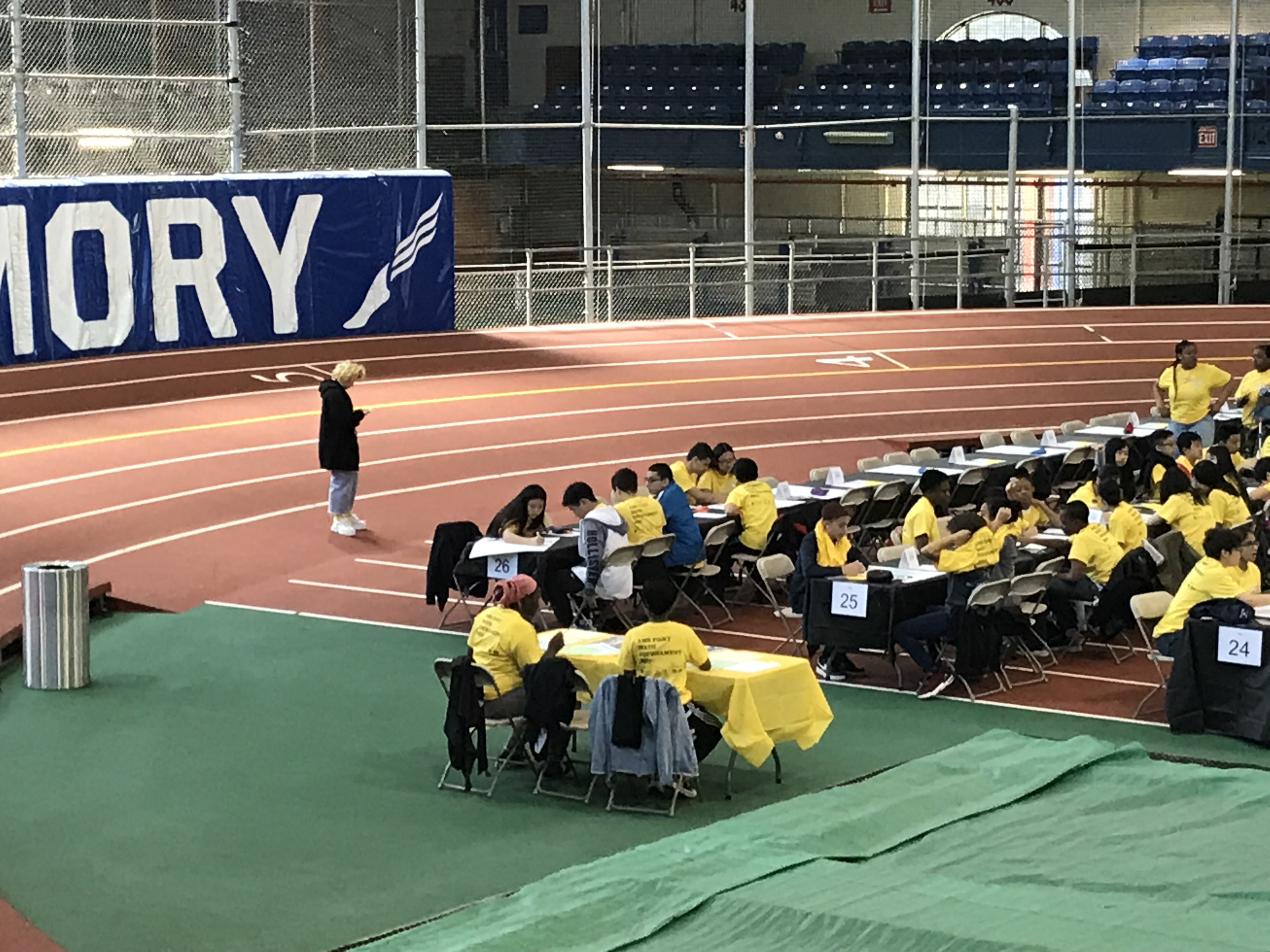 My kid stands alone, at the edge of the math competition.